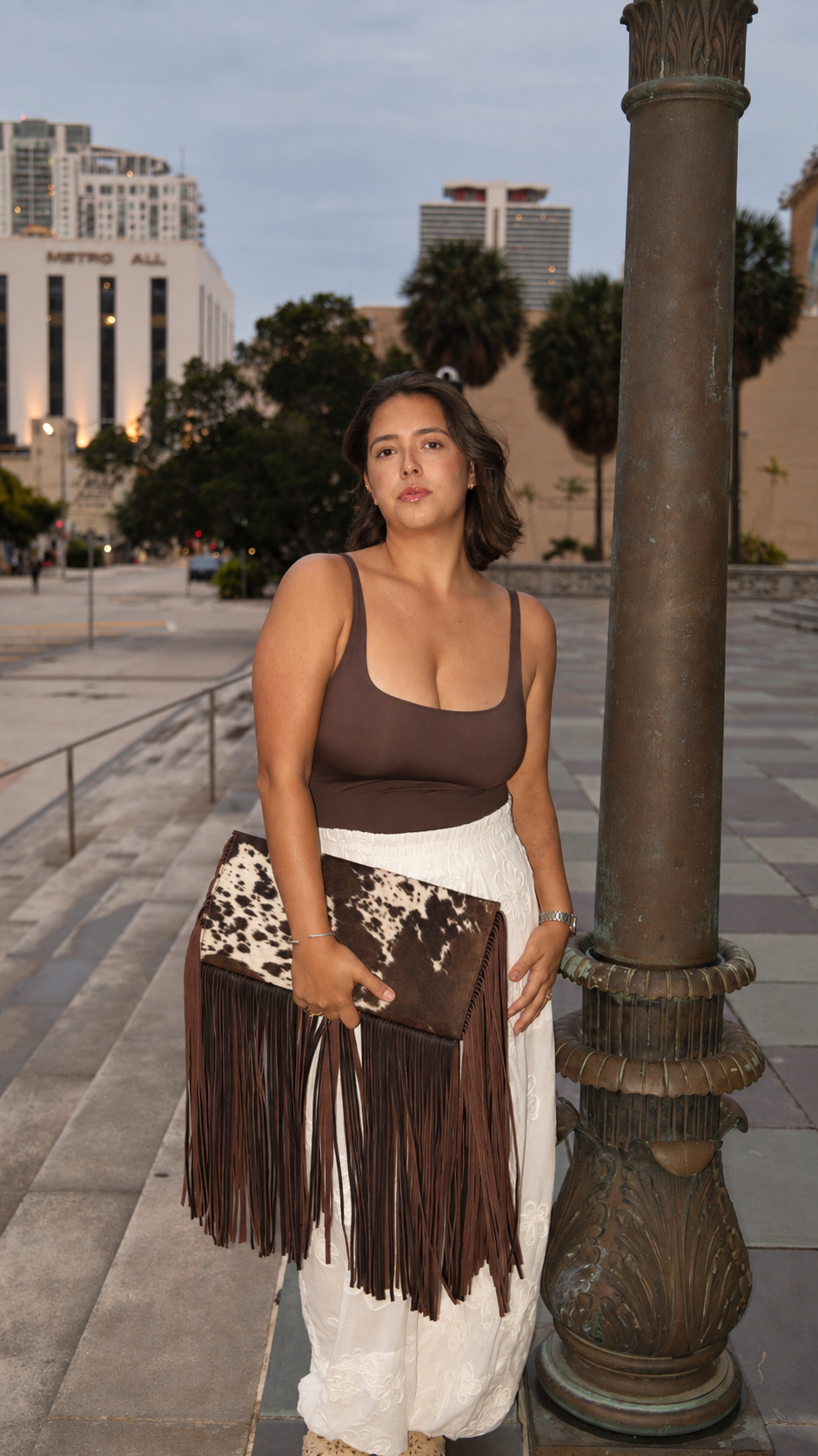Riga Clutch – Cow Print Brown Fringes