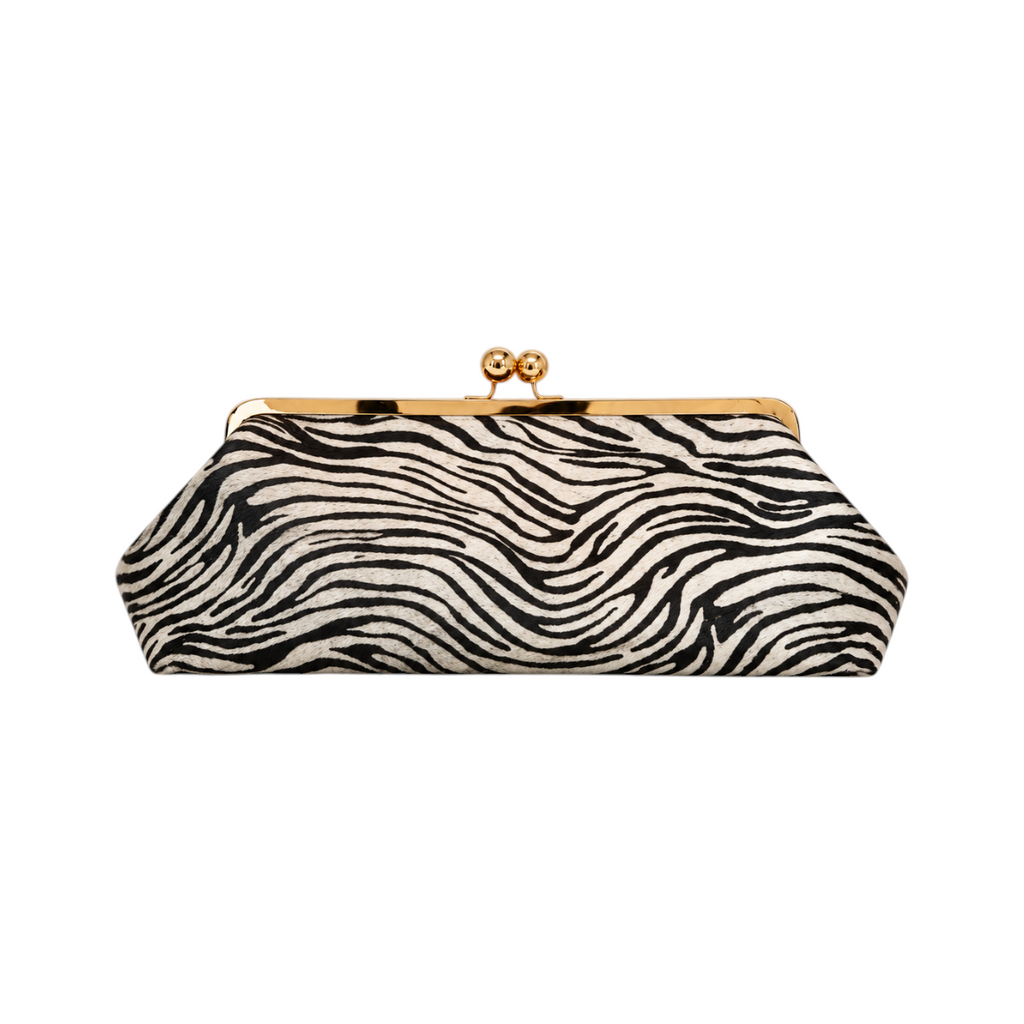 Jesalin Sette Lungo clutch in zebra-print cowhide leather with a gold kisslock closure and structured silhouette.