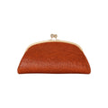 Jesalin Aluna clutch in brown ostrich-embossed leather with a gold kiss lock frame and rigid structure.