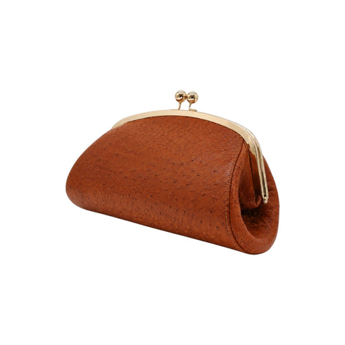 Jesalin Aluna brown ostrich-embossed leather clutch with a gold kiss lock frame on a white background