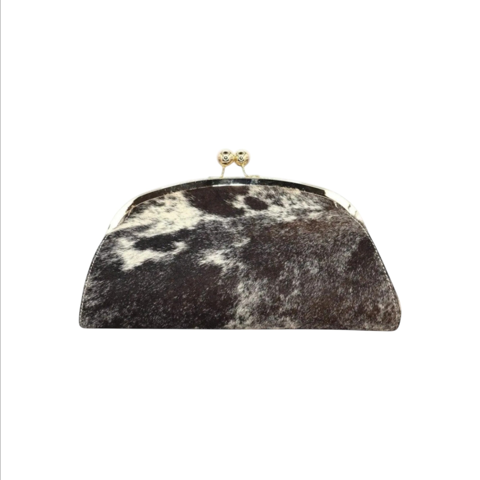 Jesalin Aluna rigid clutch bag in black and white cow print leather with a gold kiss lock frame
