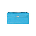 Jesalin Angelo blue ostrich-embossed leather clutch with a structured silhouette and silver metallic clasp