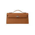 Jesalin Angelo camel grained leather clutch with a structured silhouette and silver metallic clasp closure.