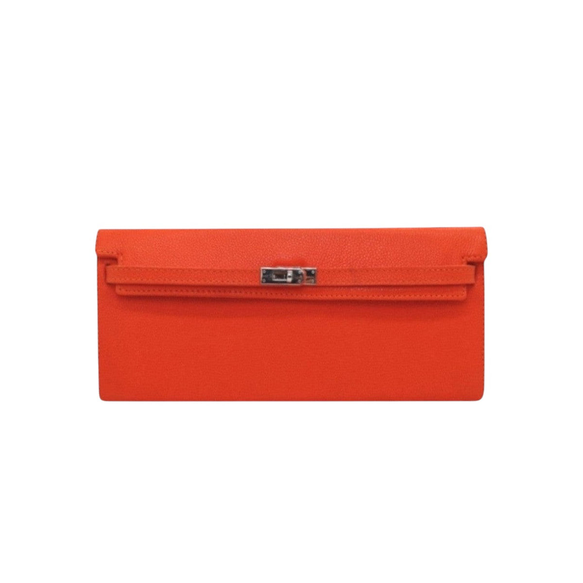 Jesalin Angelo orange grained leather clutch with a minimalist elongated silhouette and silver metallic clasp.