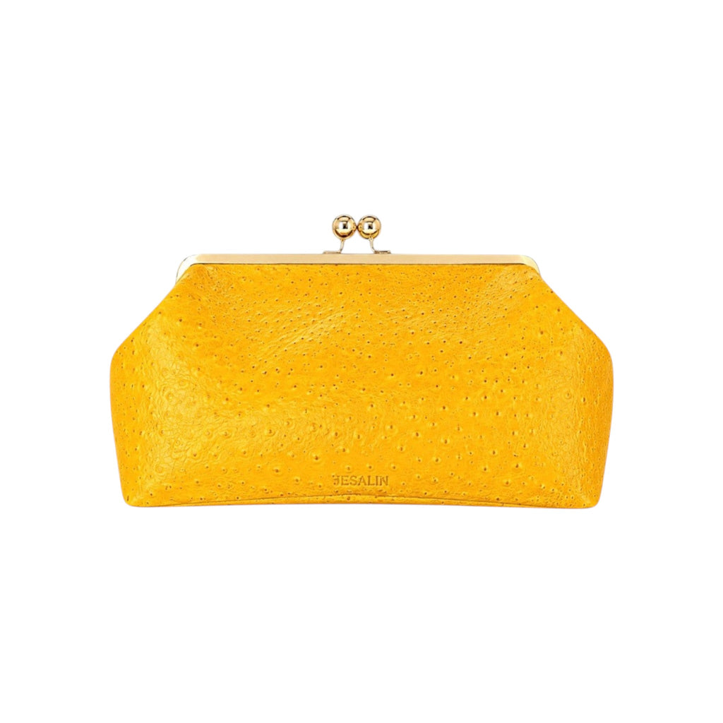 Bolso Sette Jesalin amarillo en piel con grabado de avestruz, cierre kisslock dorado y diseño elegante.