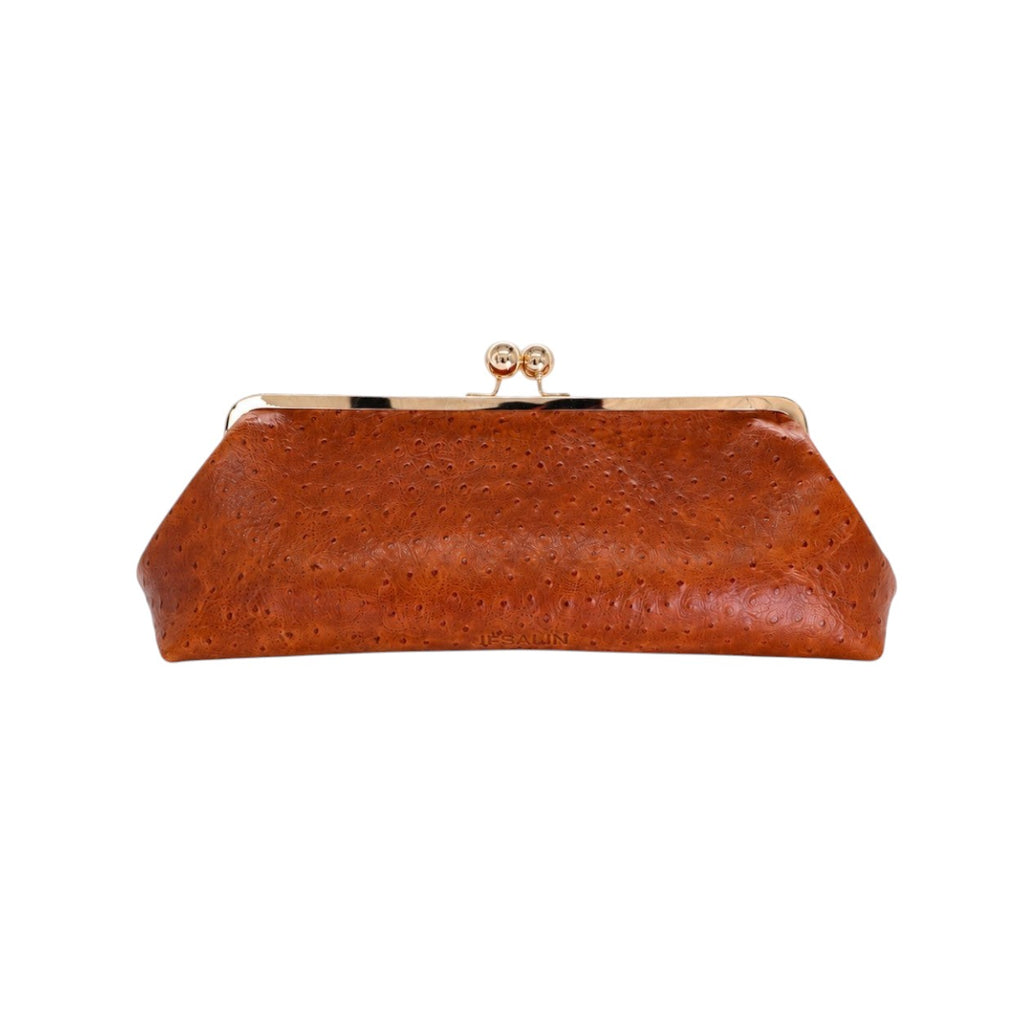 Bolso de mano Jesalin Sette Lungo en piel color coñac con grabado de avestruz y cierre kisslock dorado elegante.