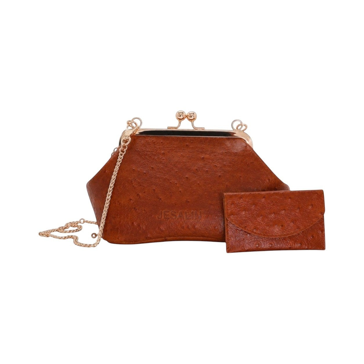 Bolso Jesalin Sette Petito color cognac en piel con grabado de avestruz, cierre kisslock y cadena dorada.