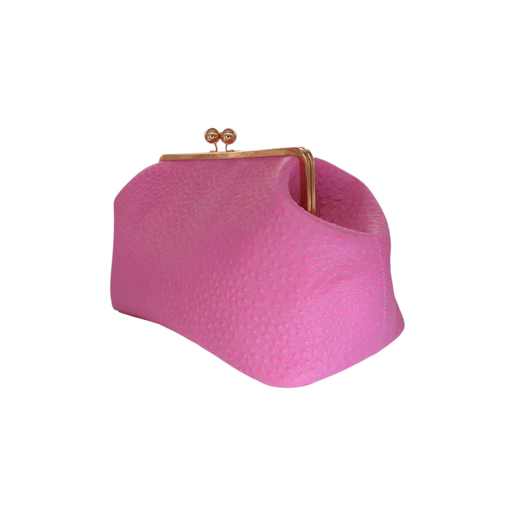 Bolso Jesalin Sette en piel rosa con grabado de avestruz, diseño estructurado y cierre metálico kisslock elegante.
