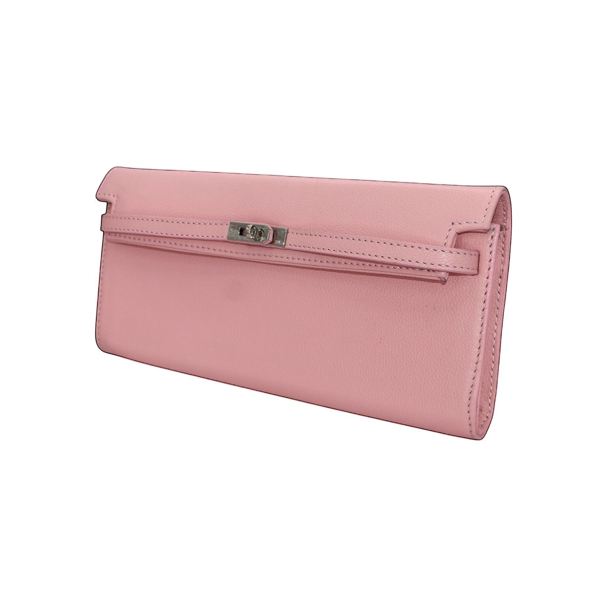 Bolso de mano Jesalin Hermes Rosa en piel grabada de color rosa con cierre metálico elegante y diseño artesanal.