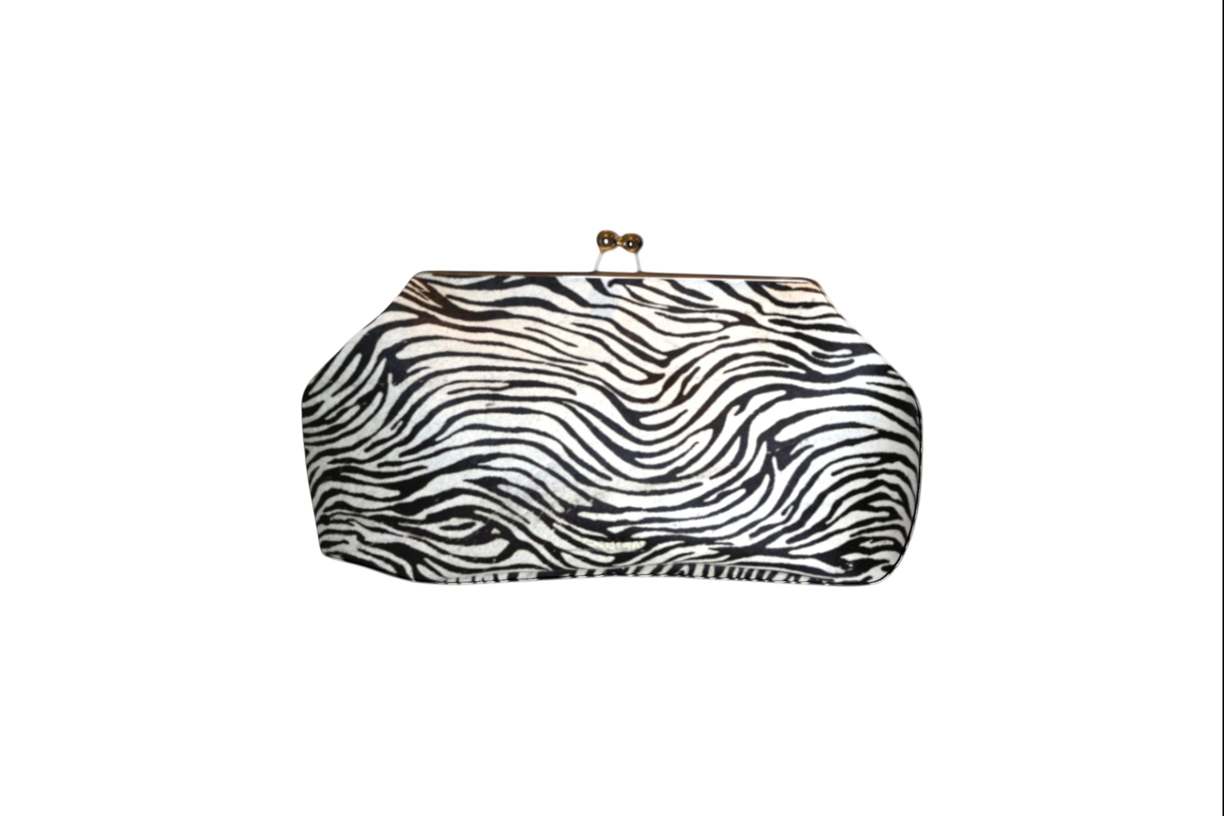 Pouch extra grande Jesalin con estampado de cebra en piel bovina con pelo y cierre metálico retro