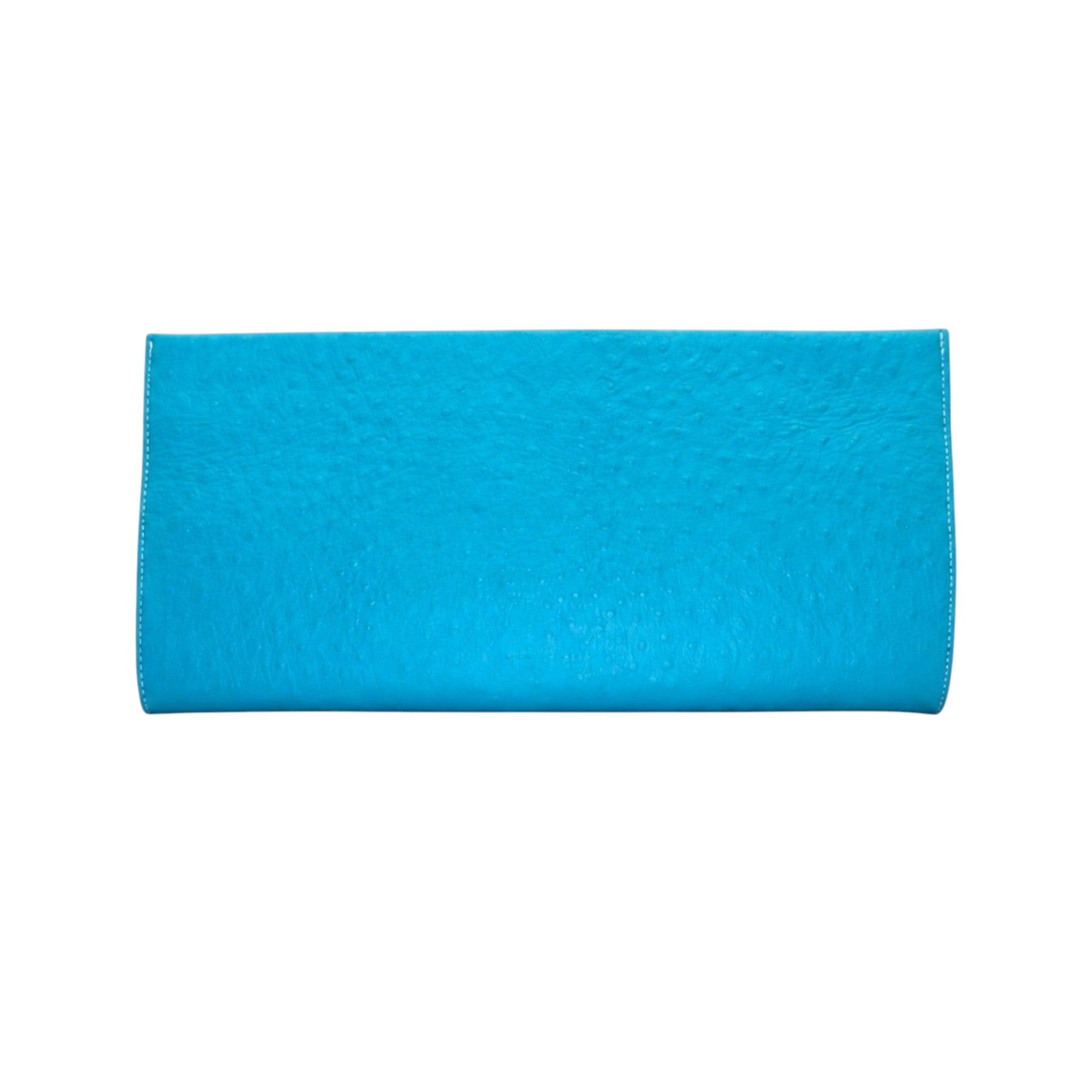 Jesalin Riga clutch in aqua blue bovine leather with an ostrich-embossed texture and a sleek, structured silhouette.