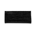 Jesalin Riga clutch in black genuine leather with a structured, elongated silhouette and crocodile-effect texture.