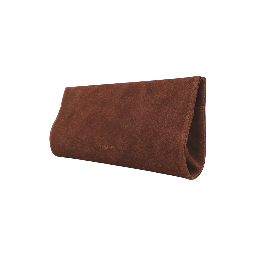 Jesalin Riga clutch bag in cafe brown bovine suede with a structured elongated silhouette and magnetic closure
