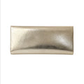 Jesalin Riga clutch in metallic platino gold bovine leather with a structured rectangular silhouette.