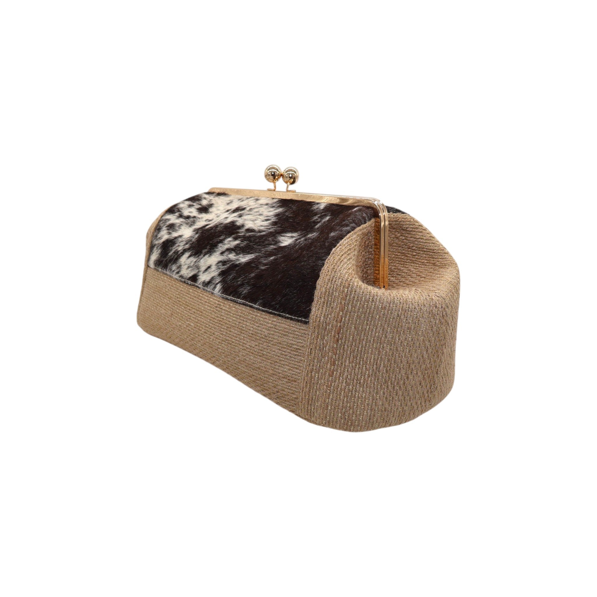 Jesalin Sette unique handbag featuring natural jute, cow print hair-on hide, and a gold kiss lock metal frame.