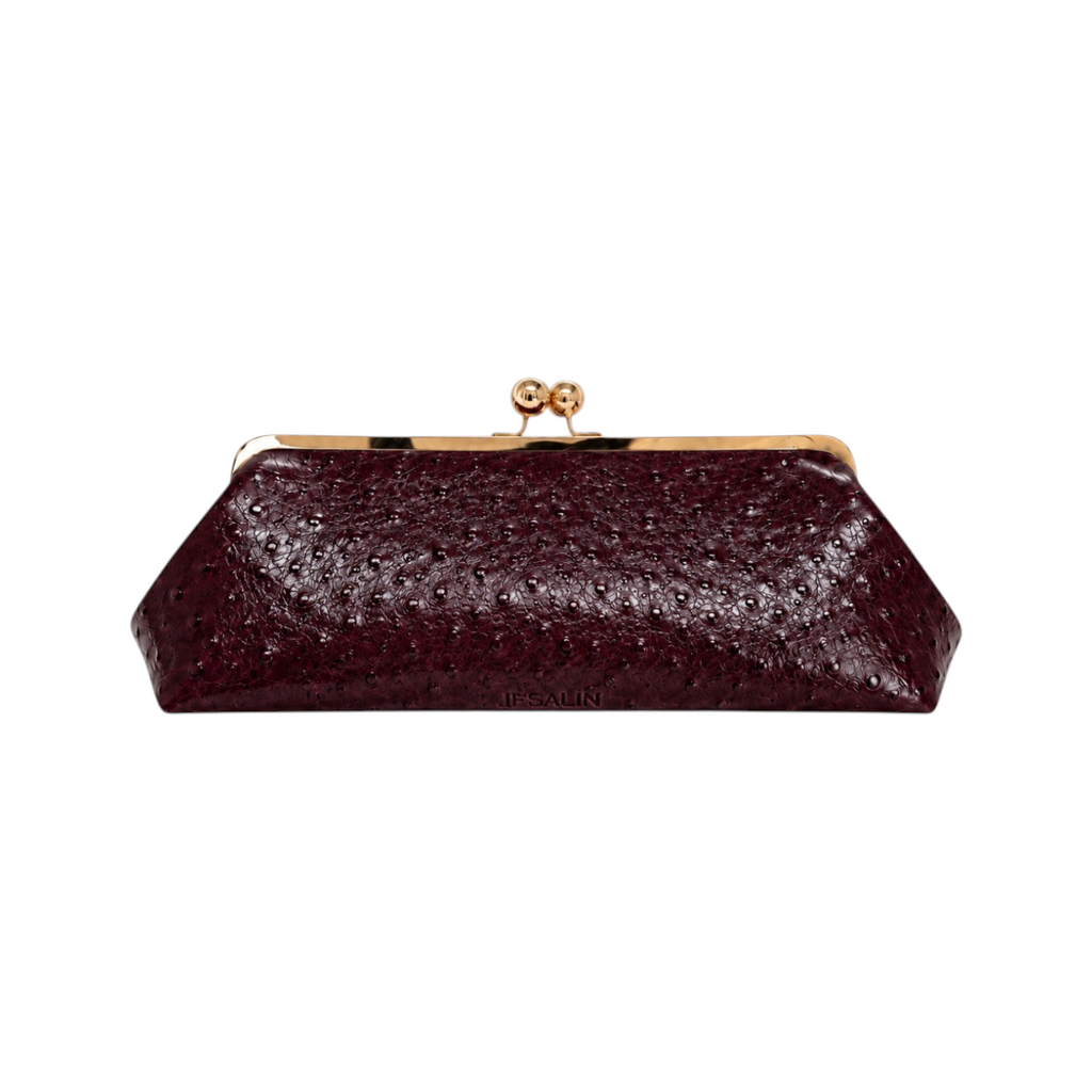 Jesalin Sette Lungo burgundy ostrich-embossed leather clutch with gold kisslock closure and pleated silhouette